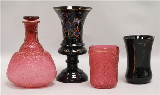 A quantity of Bohemian glass to include a ruby carafe and tumbler, a tumbler and a vase